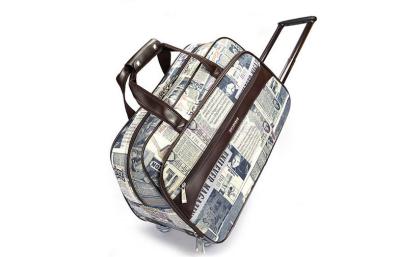 China PVC fabric Large trolley travel bag newspaper patterned for business travel for sale