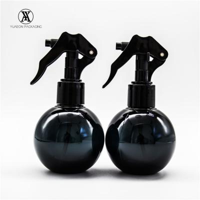 China 150ml Cosmetic Liquid Black Color Empty Ball Shaped Fine Mist Bottle Plastic Cleansing Spray With Trigger for sale