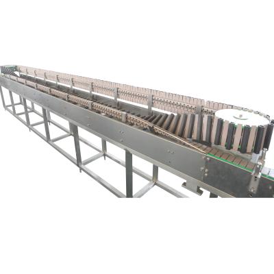 China Factory price heat resistant bottle invert conveyor for hot juice filling production line for sale