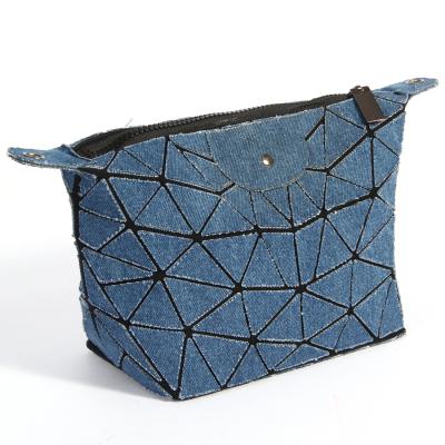 China Fashion geometric denim bag denim fabric makeup bag cowboy fabric travel cosmetic packaging bag for sale