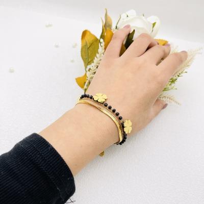 China CLASSIC Luxury Multilayer Black Agate Gold Plating Stainless Steel Rice Beads Chain Flat Snake Chain Bracelets for sale