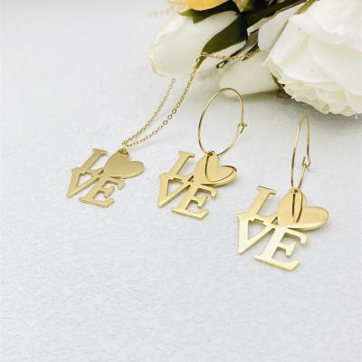 China TRENDY Classic Hollow Letter Heart LOVE Big Pendant Gold Plated Stainless Steel Earrings Necklaces Wedding Jewelry Set for sale