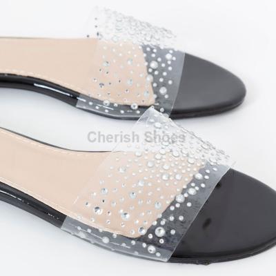 China Newest hot selling sexy shinning slippers PVC ladies sandal shoes flats girls fashion trend vamp sliders women clear transparent sandals for sale