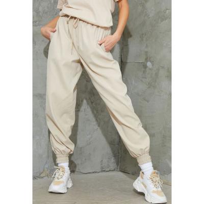 China OEM Sport Wear Women Jogger Wholesales Sweatpants Elastic Waist Women Breathable Pants Loose Women Joggers With Pocket for sale