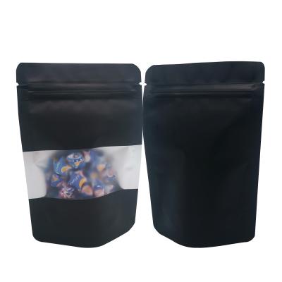 China Mysterious Black Matte Odour Proof Stand Up Ziplock Mylar Bags with Window for Candy Food Snacks Storage Packaging for sale