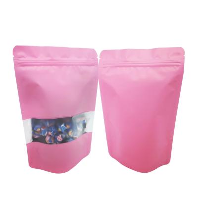 China Heat Sealable Resealable Solid Pink Color Foil Liner Mylar Stand Up Zipper Pouch Bags with Window for Packaging Food for sale