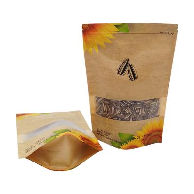 China Water Proof Resealable Ziplock Kraft Stand Up Pouches With Window For Sunflower Seed Nuts Food Packaging for sale