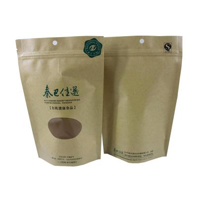 China Printed Eco Friendly Resealable Stand Up Kraft Paper Pouch Bags With Custom Round Window For Tea Leaves Beans Packaging for sale