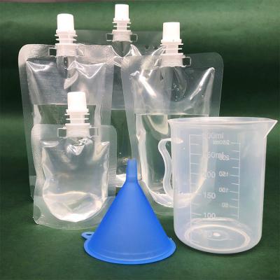 China Customizable Transparent Clear Stand Up Spout Pouches for Milk, Juice, Beverages, Coffee Packaging for sale