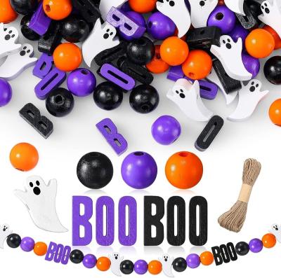 China Wholesale Colorful Ghost Halloween DIY Jewelry Material Wooden Beads And Rope Skeleton Tassel Mini Skull Head Beads Hemp Wooden Beads for sale