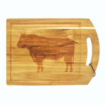 China Sustainable Promotional Kitchen Customized Cow Pattern Acacia Wood Chopping Chopper With Handle for sale