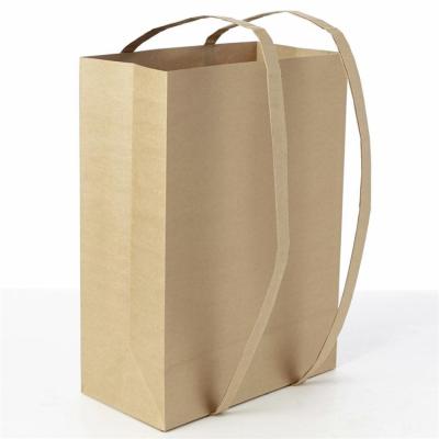 China Recyclable Unique Creative Eco Friendly Backpack Styled Grocery Kraft Paper Shopping Bag With Handles for sale