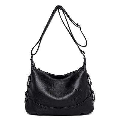 China Large Capacity Solid Color PU Leather Women Casual Trapeze Hobo Bag With Cross - Body Belt for sale