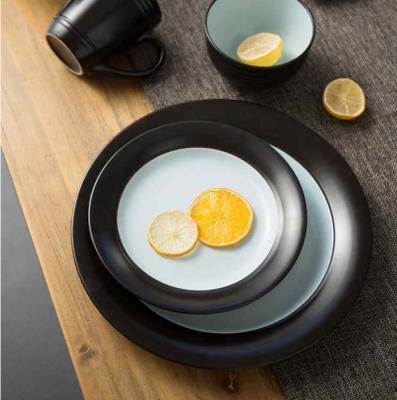 China Reactive Glaze Embossed Durable Dinnerware Sets Round Matt Black for sale