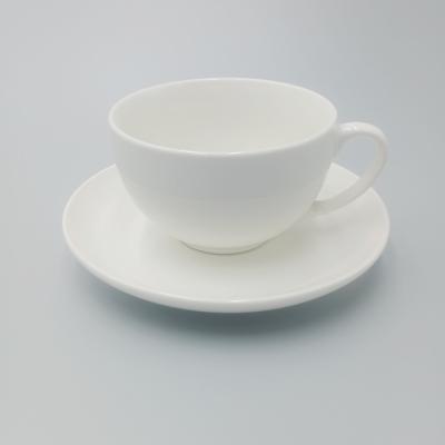 中国 レストランの陶磁器のコーヒー カップは受皿が付いている注文の磁器の茶コーヒー カップを置いた 販売のため