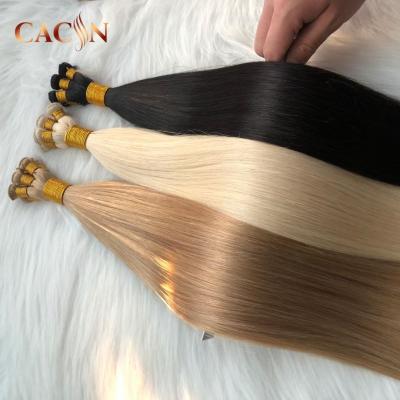 China Silky Straight Wave Hand Tied Tape Hair Extensions European Rey Hair Hand Tied Wefts for sale