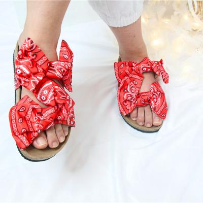 China Lit 2020 New Bow Fashion Ladies Design Summer Beach Diamond Flat Sandals Women Diamond Sandals for sale