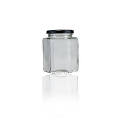 China Wholesale 50ml 100ml 180ml 280ml 380ml 500ml 750ml Hexagonal Recyclable Eco-friendly Glass Food Honey Jam Storage Jar With Metal Lid for sale