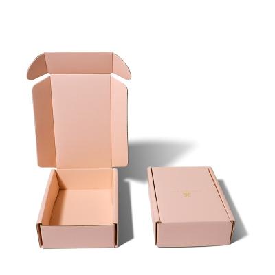 China Recycled Materials Customized LOGO Pink Corrugated Cardboard Clothes Shoes Packaging Mailbox Packaging Shipping Box for sale