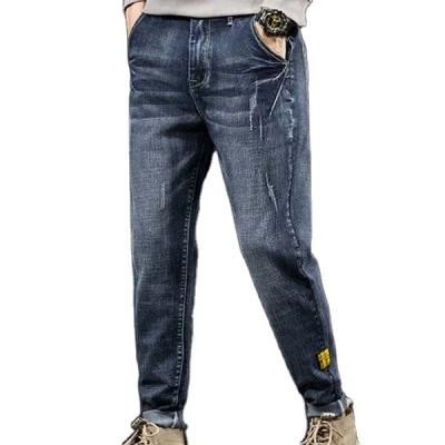 China 2021 fashion men's high quality letter spliced ​​fabricas de celana cotton denim pants QUICK DRY good sale taper ripped jeans pants for sale