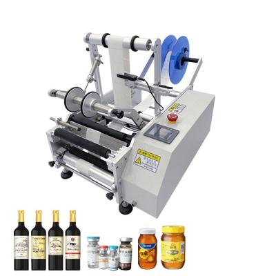 China Food Milozenge Semi-auto Round Bottle Pneumatic Labeling Machine for sale