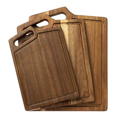 China Extra Thick Acacia Wood Cutting Board Viable for the Kitchen with Handles and Juice Groove for sale