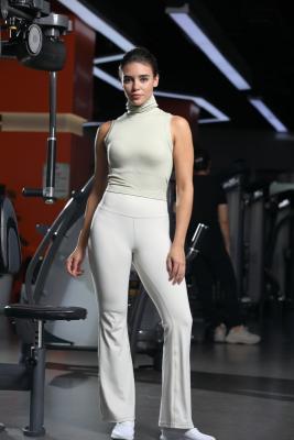 China Turtle Neck Crop Top Compressão Fit Construído em sutiã Banda de fundo elástica à venda