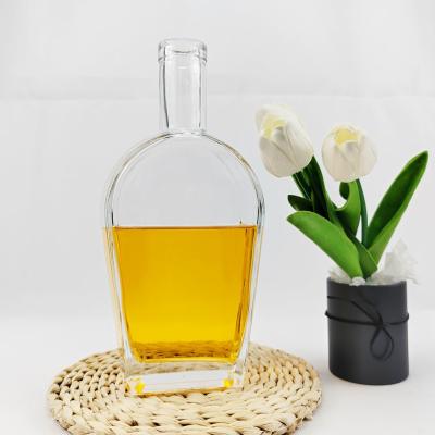 China Eco-friendly Glass Body 750ml Glass Wine Bottle with Lid in Unique Design Shape for sale