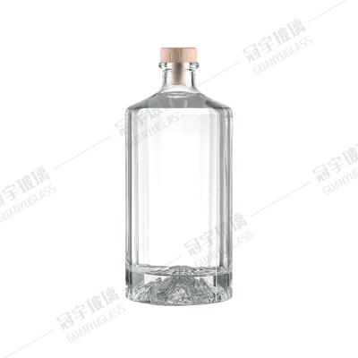 China Acceptable Customer's Logo Creative Clear Wine Bottle Short Neck Liquor Wine Glass Bottle for sale