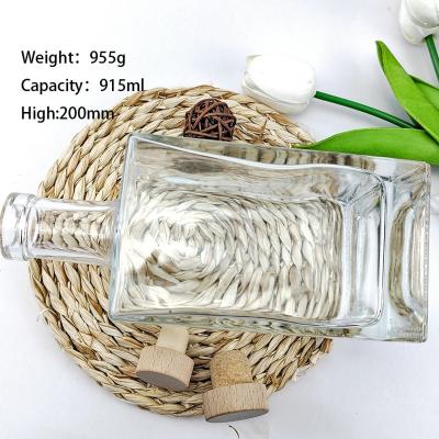 China Vodka Spirits Glass Bottles with High Polymer Plug and Screen Printing Surface for sale