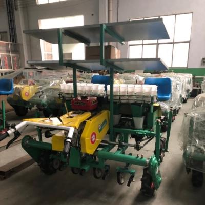 China Vegetable machine self-propelled pull farmland sale cabbage vegetable transplanter depth of row spacing can be adjusted for sale