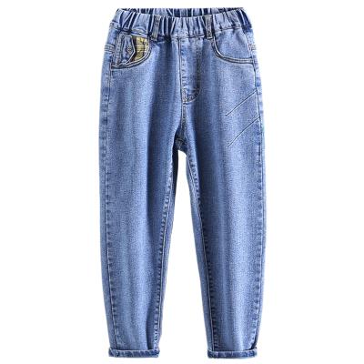 China Boys anti-pilling children's clothes fall pants children's big children's blue Korean custom denim pants for sale