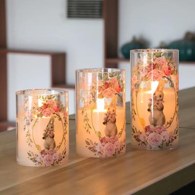 China Religious Activities Orstar Easter Bunny Flameless Candles with Outside, Rabbit LED Flickering Glass Candles, Battery Operated Candles for sale