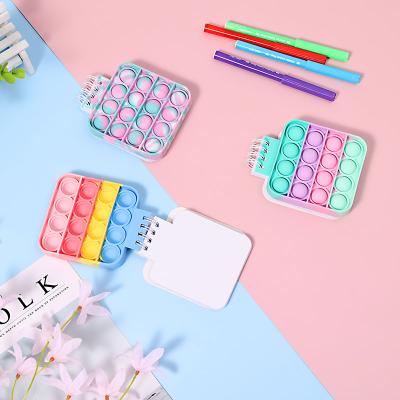 China Wholesale High Quality Loose Leaf Decompression Notebook Pop Up Bubble Notepad Lift Finger Bubble Silicone Case Notepad for sale