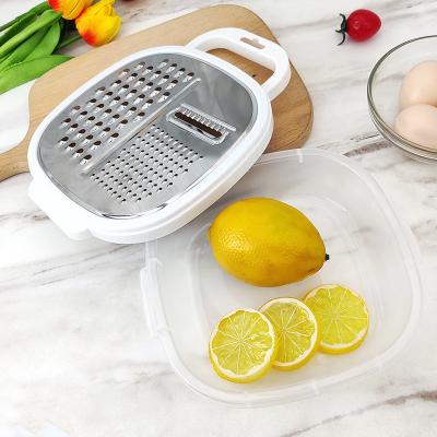 China Viable Universal Kitchen Potato Peeler Slicer Rub Plastic Box 4-in-1 Grater Stainless Steel Grater Lunch Box Grater for sale