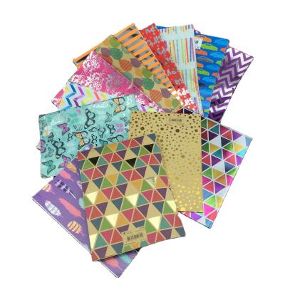 China Factory Direct Supply Luxury High Quality Christmas Party Gift Wrapping Paper With Colorful Printing And Foil Stamping for sale