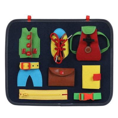 China Let children learn and practice early skills education essential dressing montessori felt busy board board toddler bag zipper toddler for sale