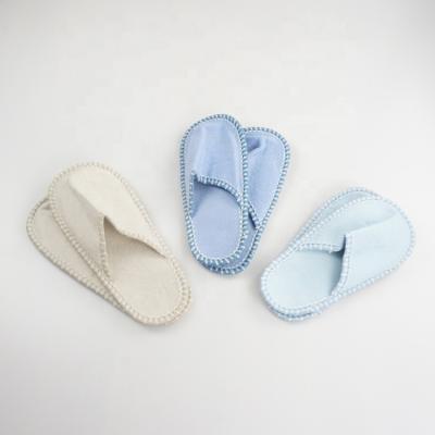 China Amazon 2020 comfortable stretching custom indoor felt slipper women and men disposable slipper for home guests for sale