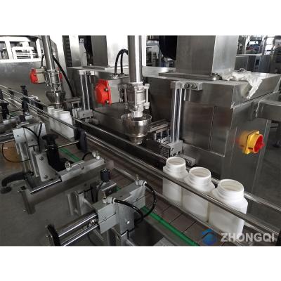 China Small Scale Food Bottle Packing Machine Water Bottle Filling Machine Price For Wine Packages for sale