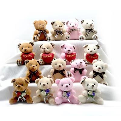 China Plush Bride's Bouquet Holding Flowers Decoration Wedding Gift Doll Teddy Bear Plush Toy Chain Pendant for sale