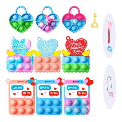 China Present Valentine's Day Other Novelty and Gag Toys for Christmas Series Silicone Noises Stir Key Chain Set Include 9Pcs Christmas Stirring Person for Christmas Key Chain for sale