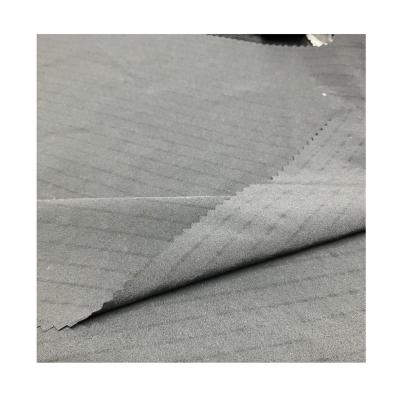 China Fabric 240T Taslan Waterproof Nylon Taffeta Nylon Stretch Fabric 4 Way Plain Woven Fabric UPF 40 for sale