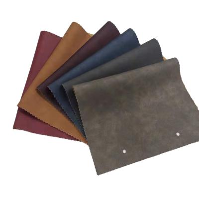 China waterproof synthetic leather material for sofas leatherette fabric for making bags for sale