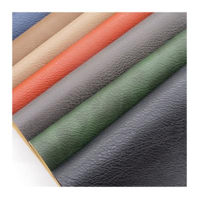 China Hot sales two tones lychee elastic synthetic leather material for sofas and seat cover and bags for sale