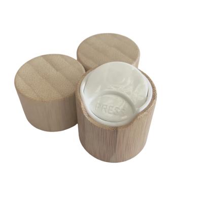 China Non Spill 28-410 Custom Nature Press Cap Bamboo White Cover Disc Top Caps For Cleaning Water Bottles for sale