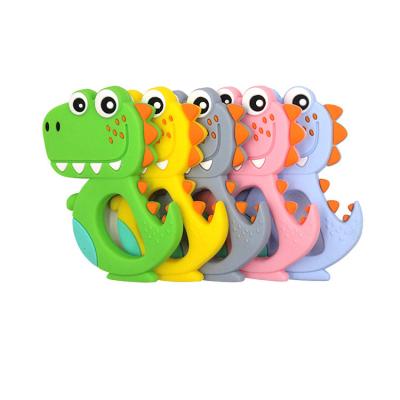 China Non-Toxic Silicone Free Newborn Baby Dinosaur Cartoon Teether BPA Soother Chewable Toy for sale