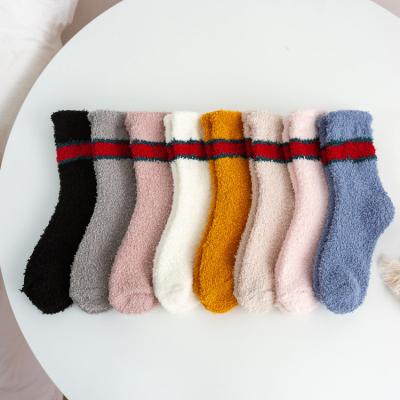 China New Winter Pink Fluffy Warm QUICK DRY Fuzzy Socks Custom Logo Colorful Blue White Winter Socks Women for sale