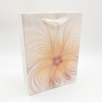 China M Wholesale Luxury Recyclable Shopping Bag Gift Glitter Printed Paper Bag With Ribbon Handle for sale