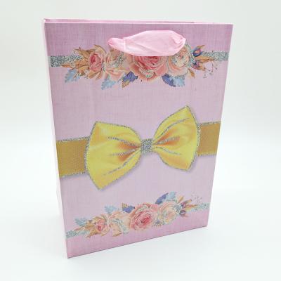 China M Wholesale Luxury Recyclable Shopping Bag Gift Glitter Printed Paper Bag With Ribbon Handle for sale