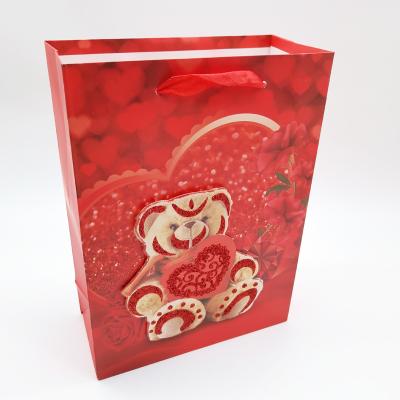 China M Wholesale Luxury Recyclable Purse Shopping Gift Packing 3D Heart Printed Paper Bag With Ribbon Handle for sale